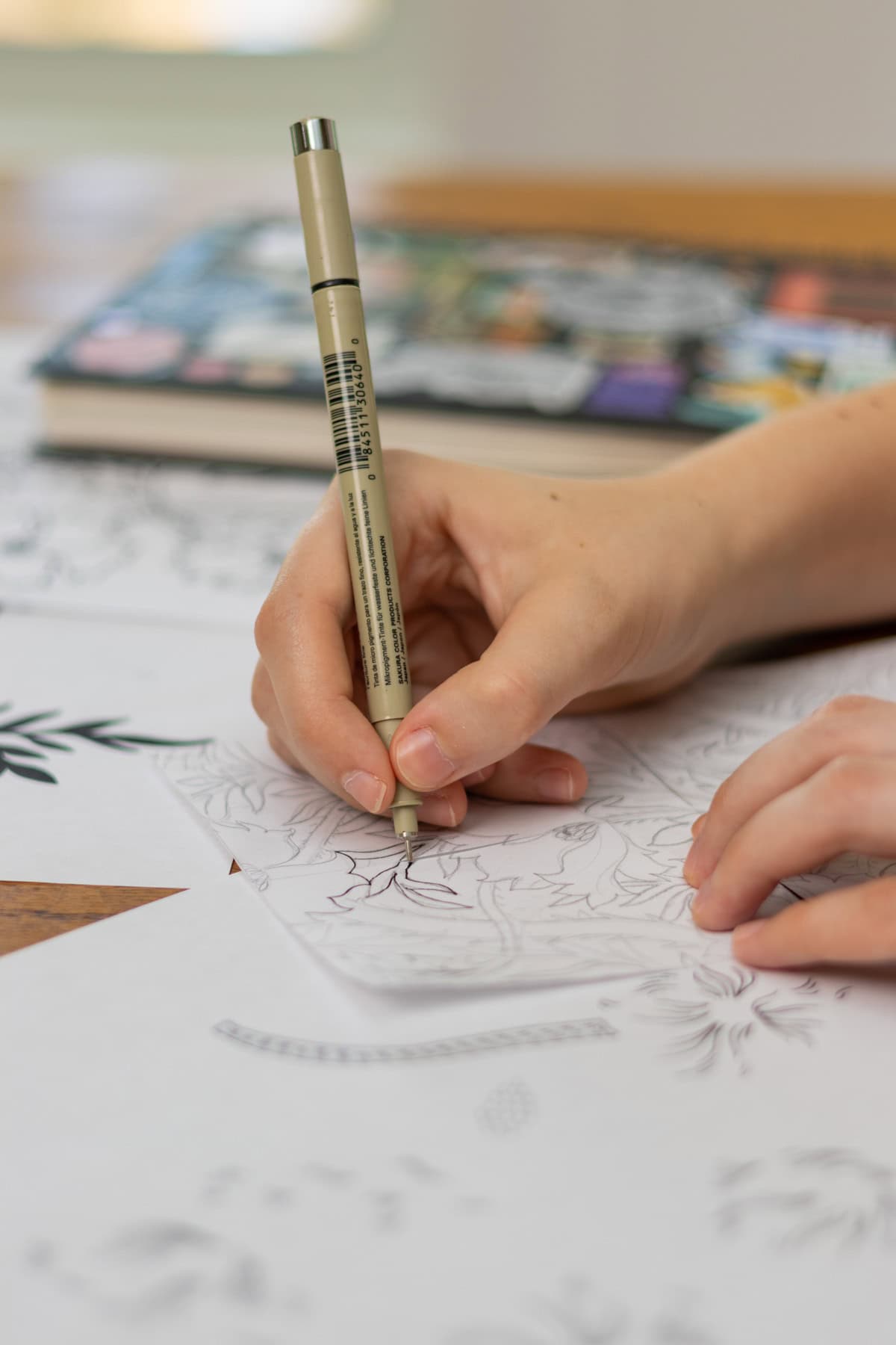 beth drawing a pattern.